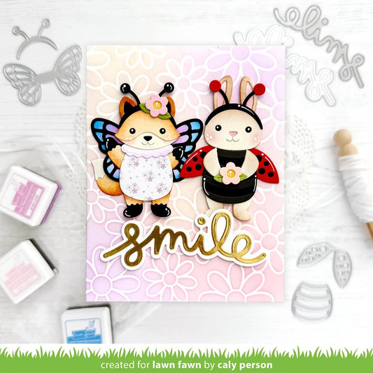 Eine Grusskarte mit Fuchs und Hase auf einem Floralen Hintergrund