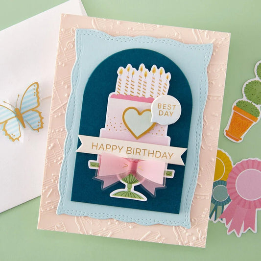Beispielkarte mit der Spellbinders Playful Stitched Panels Etched Dies mit gewellten Rahmen und Anhänger