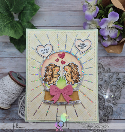 Hintergrund im Snow Globe auf Beispielkarte mit Lawn Fawn Outline hearts stencil Schablone.